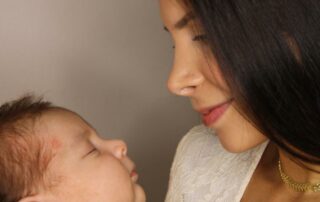 mother holding her baby