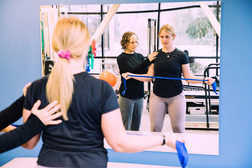 physical therapist working with patient at Flex PT