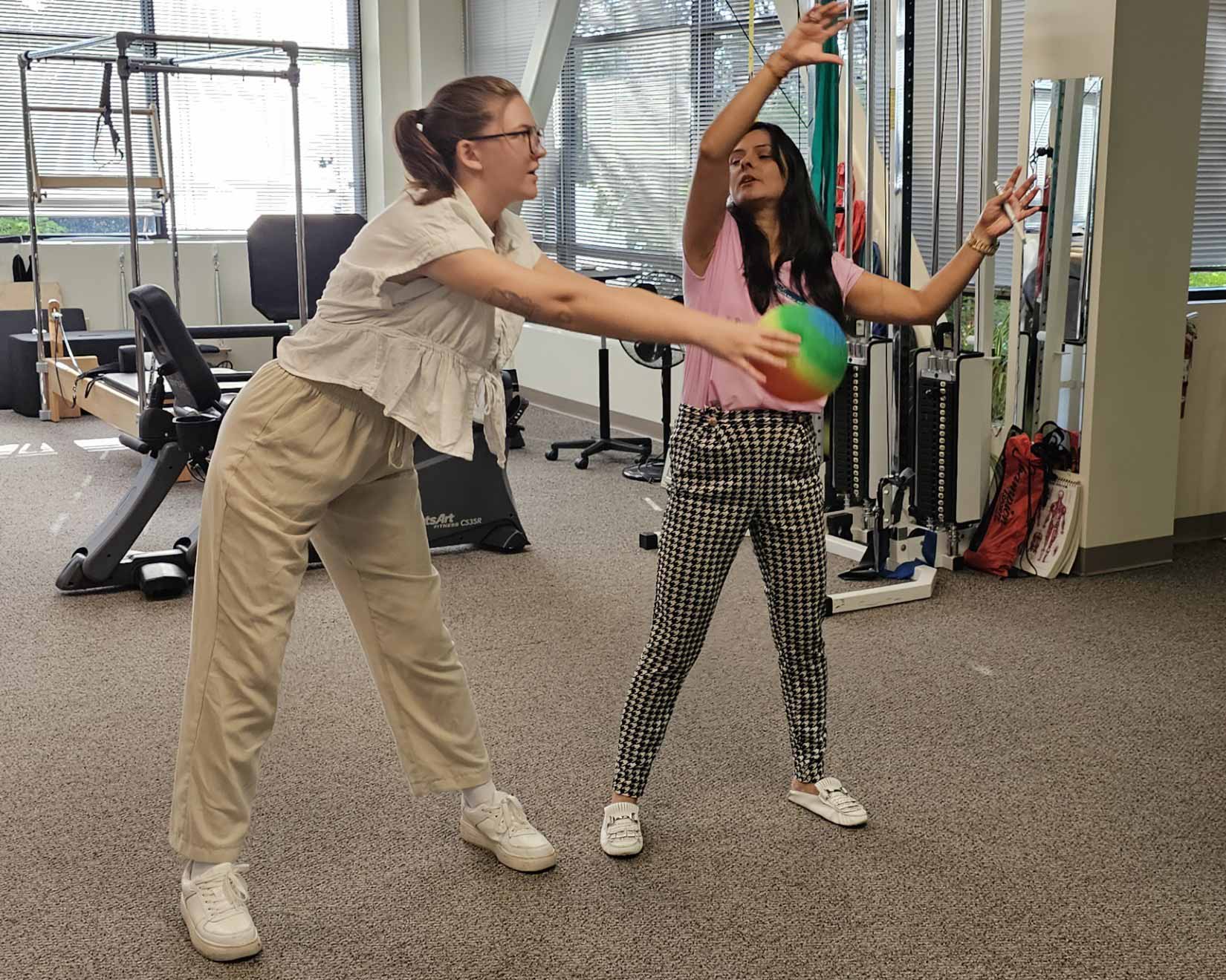 Vestibular-3-opt Divya Negi helps a patient with balance practice